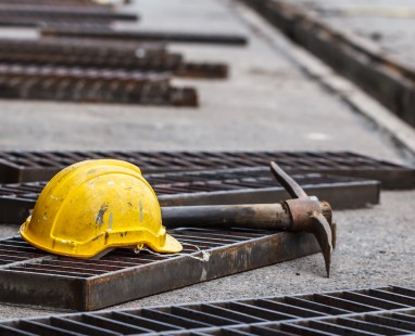 Yellow hard hat on construction site