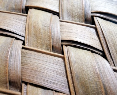 Close-up of woven harakeke basket showing traditional weaving technique